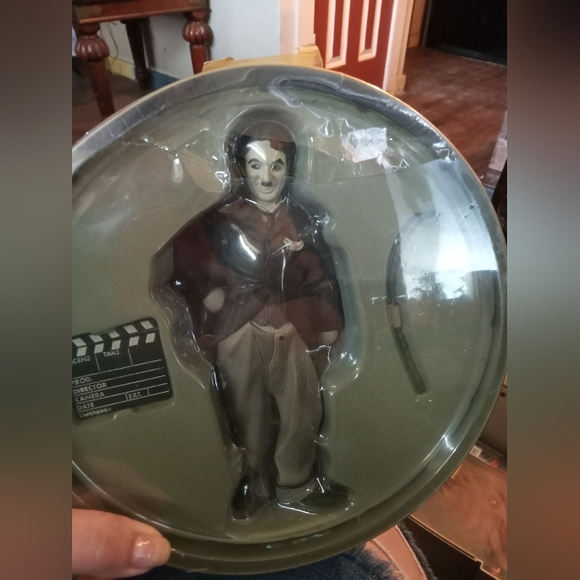 Movie Icon's Charlie Chaplin still in tin box plastic is a little warped. - Picture 2 of 2